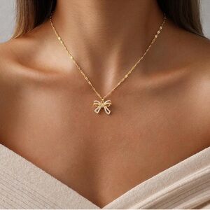 Anthropologie  Lexi Gold Bow Necklace
